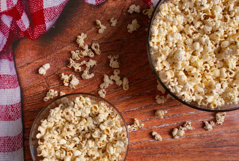 Can You Eat Popcorn With Braces? - The Popcorn Predicament + 7 BETTER Alternatives 2 Can You Eat Popcorn With Braces Buttered Popcorn Sweet Salty Microwave